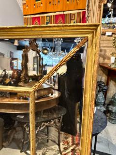Early 19th Century English Segmented Gilt Carved Wood Mantle Mirror - 4612343