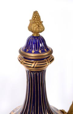 Early 19th Century Matching Pair of Bronze Mounted Porcelain Urns - 801839