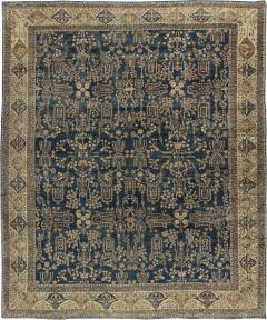 Early 20th Century Persian Kirman Navy Blue and Camel Wool Rug - 2447943