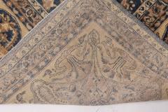 Early 20th Century Persian Kirman Navy Blue and Camel Wool Rug - 2447946