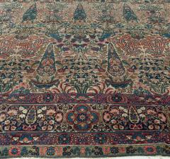 Early 20th Century Persian Kirman Wool Rug in Blue Brown Green Pink and Red - 2454289