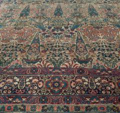 Early 20th Century Persian Kirman Wool Rug in Blue Brown Green Pink and Red - 2454290