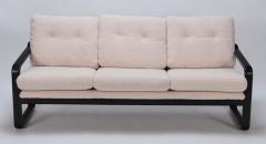 Ebonized French three seat sofa recently upholstered in Boucle fabric - 3242915