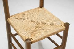 Eight Solid Wood and Straw Dining Chairs Europe ca 1950s - 3377005