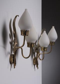 Einar Backstrom Einar B ckstr m pair of brass and opaline glass wall lamps - 2039989