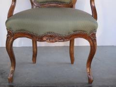 Elegant Set of 4 French Louis XV Style Carved Walnut Open Armchairs - 1089427