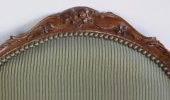 Elegant Set of 4 French Louis XV Style Carved Walnut Open Armchairs - 1089429
