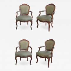 Elegant Set of 4 French Louis XV Style Carved Walnut Open Armchairs - 1090940