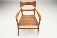 Emanuele Rambaldi Emanuele Rambaldi Fruitwood Armchair with Woven Cane Seat Italy 1950s - 2884978