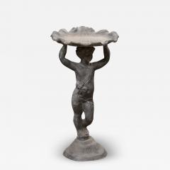 English Iron Greco Roman Style Standing Cherub Carrying a Sea Shell Bird Bath - 3603333