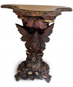 English Regency console with a carved bird floral base over a shaped top - 4635537