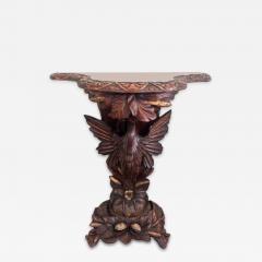 English Regency console with a carved bird floral base over a shaped top - 4689847