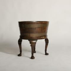 English oval oak planter or wine cooler with brass braces and tin liner on stand - 2007568