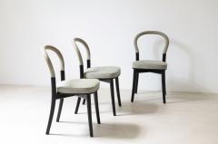 Erik Gunnar Asplund Elegant set of 8 chairs in wood and fabric covering - 3891537