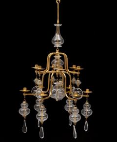 Erik H glund A gilt wrought iron and glass chandelier by Erik Hoglund for Boda  - 3792101