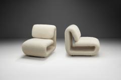 Etienne Henri Martin A Pair of Model 1500 Lounge Chairs by Etienne Henri Martin France 1960s - 3986917