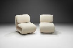 Etienne Henri Martin A Pair of Model 1500 Lounge Chairs by Etienne Henri Martin France 1960s - 3986918