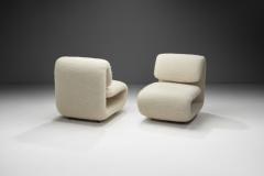 Etienne Henri Martin A Pair of Model 1500 Lounge Chairs by Etienne Henri Martin France 1960s - 3986919