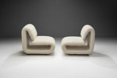 Etienne Henri Martin A Pair of Model 1500 Lounge Chairs by Etienne Henri Martin France 1960s - 3986920