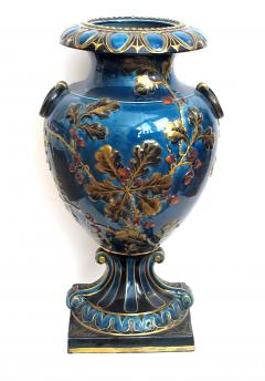 Exquisitely rendered English teal glazed ceramic urn with raised decoration - 848821