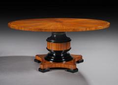 FINE QUALITY 5 1 2 FT CIRCULAR OLIVE WOOD AND EBONY DINING TABLE - 1756475