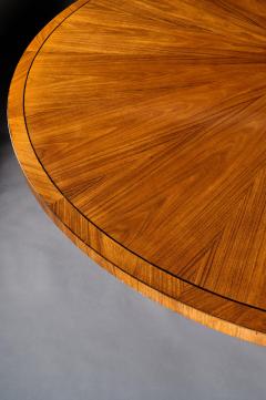 FINE QUALITY 5 1 2 FT CIRCULAR OLIVE WOOD AND EBONY DINING TABLE - 1756480