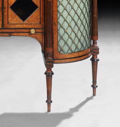 FINE REGENCY AMBOYNA AND EBONY INLAID GILT BRONZE MOUNTED SHAPED CABINET - 2744369