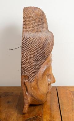 FINELY CARVED WOODEN BUDDHA FACE - 2350811