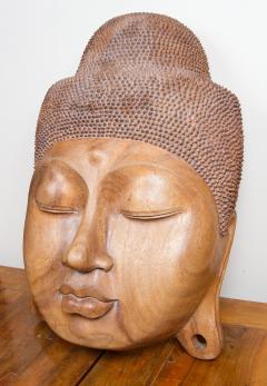 FINELY CARVED WOODEN BUDDHA FACE - 2350816