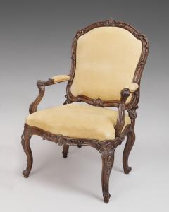 Fine Pair of Carved Walnut Armchairs with Rocaille Ribbons and Flower Motifs - 118167