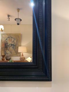 Flemish Style Ebonized Ripple Frame Mirror - 1667829