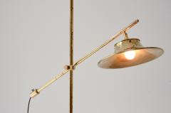 Floor lamp in brass with rocker rod base and cap in shaped and perforated brass - 3335943