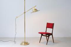 Floor lamp in brass with rocker rod base and cap in shaped and perforated brass - 3335948