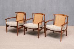 Folke Ohlsson Three Folke Ohlsson Dallas Armchairs in Teak and Cane DUX Sweden 1960s - 4793352