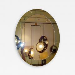 Fontana Arte A Oval Wall Mirror in the style of Fontana Arte - 256975