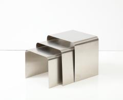 Fran ois Monnet Rare set of three nesting tables rendered in bent brushed stainless steel  - 2916606
