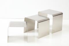 Fran ois Monnet Rare set of three nesting tables rendered in bent brushed stainless steel  - 2916608