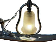 Franz Hagenauer ART DECO STYLIZED NUDE WITH PADDLE ON CANOE LAMP IN THE MANNER OF HAGENAUER - 4442731