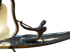 Franz Hagenauer ART DECO STYLIZED NUDE WITH PADDLE ON CANOE LAMP IN THE MANNER OF HAGENAUER - 4442733