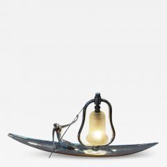 Franz Hagenauer ART DECO STYLIZED NUDE WITH PADDLE ON CANOE LAMP IN THE MANNER OF HAGENAUER - 4444123