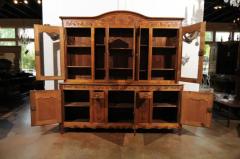 French 1820s Carved Walnut Vitrine with Glass Doors Hidden Panels and Drawers - 3422722