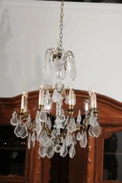 French 1860s Napoleon III Eight Light Crystal Chandelier with Brass Accents - 3424257