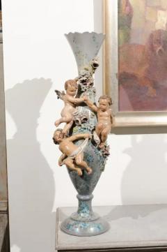 French 1870s Slender Majolica Vase with Floral D cor and High Relief Cherubs - 3420252