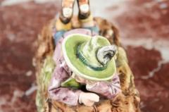 French 19th Century Barbotine Bonbon Box Depicting a Boy Laying on a Tree Trunk - 3424302