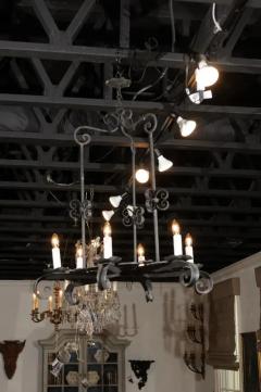 French 19th Century Black Iron Six Light Chandelier with Scrolled Motifs - 3432671