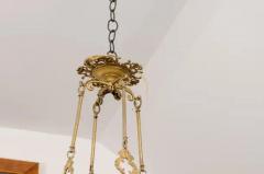 French 19th Century Bronze Twelve Light Ring Chandelier with Scrolling Arms - 3588162