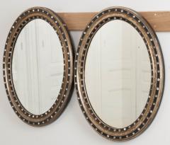 French 19th Century Ebony and Gilt Oval Mirror - 1639553