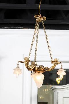 French 19th Century Gilt Metal Chandelier with Three Cherubs Holding the Lights - 3426981