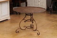 French 19th Century Round Iron Garden Table with Scrolling Base and Rusty Finish - 3555876