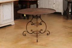 French 19th Century Round Iron Garden Table with Scrolling Base and Rusty Finish - 3555980